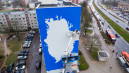 Garsi menininkų komanda „Boa Mistura“ ant Vilniaus devynaukščio tapo freską apie klimato kaitą 1