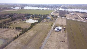 Parduodamas namų valdos paskirties sklypas Rasų g., Raizgių k., Šiaulių r. sav., 15 a ploto 5