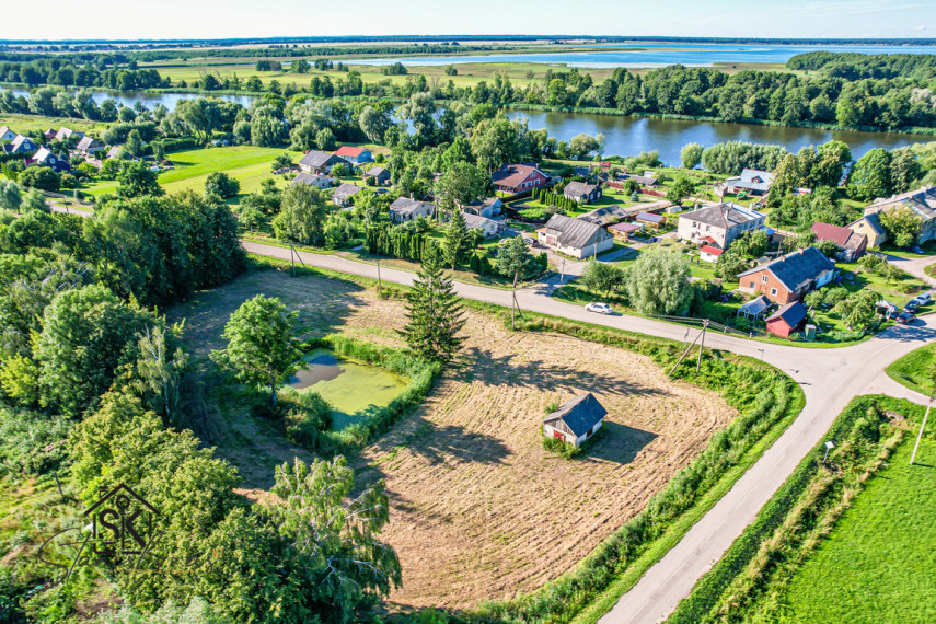 PARDUODAMAS 61,70 ARŲ NAMŲ VALDOS SKLYPAS RUSNĖS SALOJE UOSTADVARIO K. 2