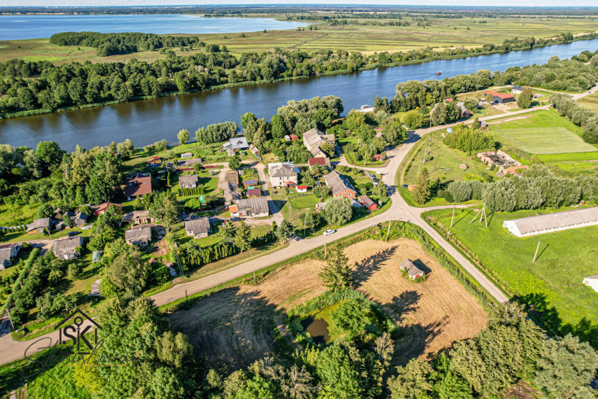 PARDUODAMAS 61,70 ARŲ NAMŲ VALDOS SKLYPAS RUSNĖS SALOJE UOSTADVARIO K. 13