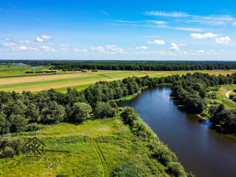 PRIE MINIJOS UPĖS PARDUODAMAS 72 ARŲ SKLYPAS SAKŪČIŲ KAIME 4