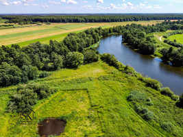 PRIE MINIJOS UPĖS PARDUODAMAS 72 ARŲ SKLYPAS SAKŪČIŲ KAIME 12