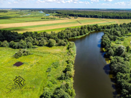 PRIE MINIJOS UPĖS PARDUODAMAS 72 ARŲ SKLYPAS SAKŪČIŲ KAIME 14