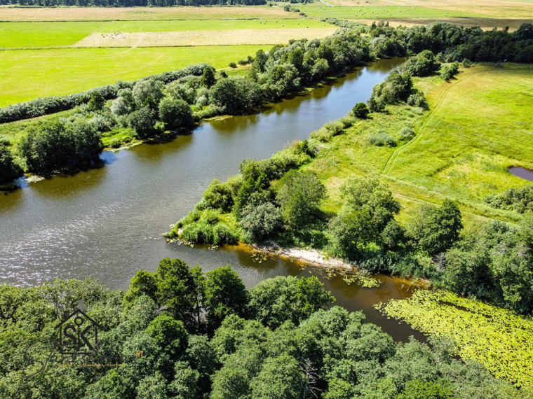 PRIE MINIJOS UPĖS PARDUODAMAS 72 ARŲ SKLYPAS SAKŪČIŲ KAIME 17