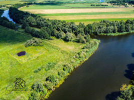 PRIE MINIJOS UPĖS PARDUODAMAS 72 ARŲ SKLYPAS SAKŪČIŲ KAIME 18