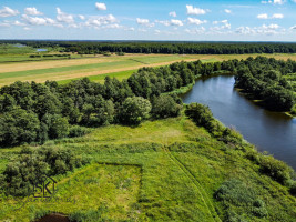 PRIE MINIJOS UPĖS PARDUODAMAS 72 ARŲ SKLYPAS SAKŪČIŲ KAIME 23