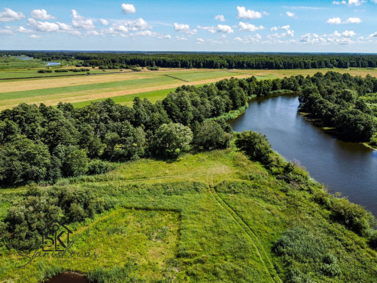 PRIE MINIJOS UPĖS PARDUODAMAS 72 ARŲ SKLYPAS SAKŪČIŲ KAIME 23